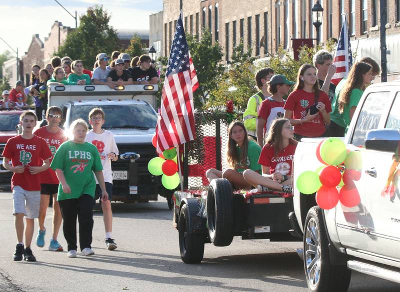 L-P High School students walk and ride during the L-P Homecoming parade on Thursday, Oct. 5, 2023 downtown La Salle.