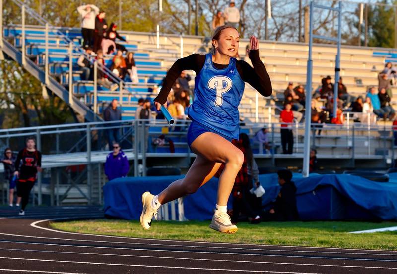 Princeton's Ashlynn Weber races at the start off the 4x200 relay Monday's Ferris Invite.
