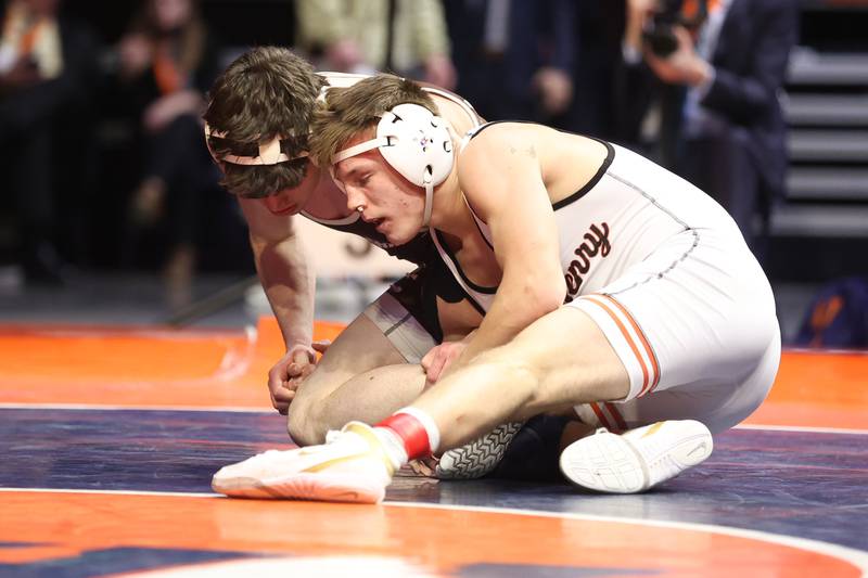 McHenry’s Chris Moore works against Mt. Carmel’s Colin Kelly in the Class 3A 160lb. championship match at State Farm Center in Champaign. Saturday, Feb. 19, 2022, in Champaign.