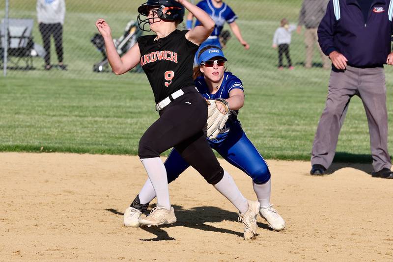 \Princeton second baseman Kelsea Klingenberg tags Sandwich's Aubrey Cyr to start a game-ending double play in Thursday''s regional semifinals at Prather Field. The Tigresses beat Sandwich 9-6.