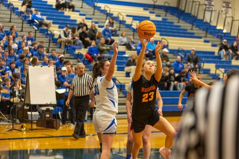 Batavia's Brooke Berggren goes in fir the shot against Batavia on Friday, Dec.19,2025 in Geneva.