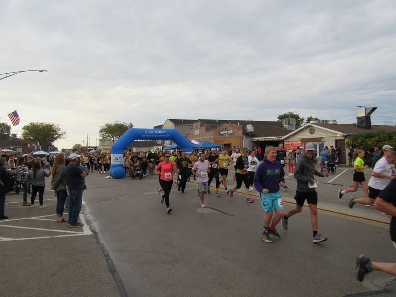 Racers take off from the starting line during the Megan's Mission 5K on Saturday.