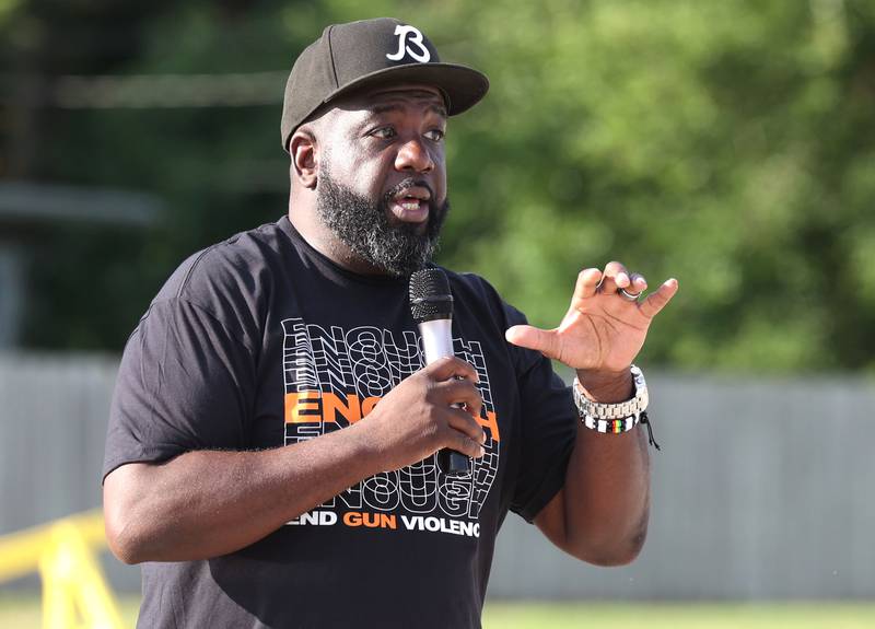 Rev. Joe Mitchell lead pastor at New Hope Missionary Baptist Church, speaks Friday, July 18, 2025, during the DeKalb Peace Walk and Rally. The event, which featured a march, food vendors and music, was held to encourage the community to work together against gun violence.