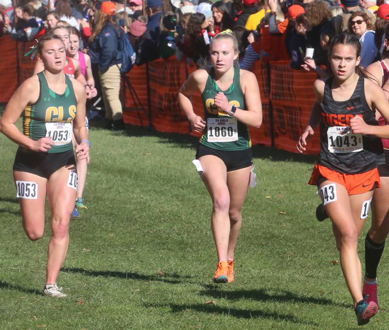 Crystal Lake South's Colette Bacidore, Abby Machesky and Crystal Lake Central's Skyler Ferrero compete in the Class 2A State Cross Country race on Saturday, Nov. 4, 2023 at Detweiller Park in Peoria.