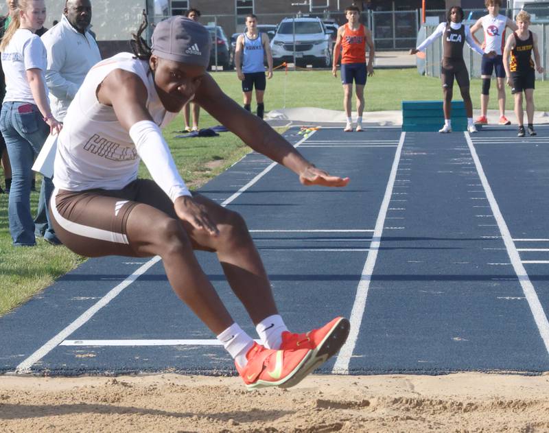 Joliet Catholic' Dylan Travis competes in the triple jump during the Class 2A Sectional on Wednesday, May 20, 2026 at Pontiac High School.