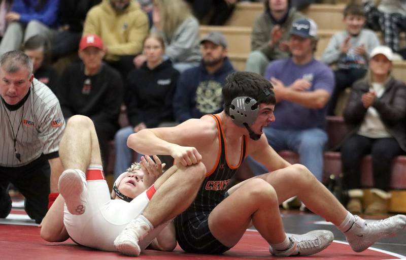 Crystal Lake Central’s Nick Zuehlke celebrates a win over Huntley’s Owen Hurd at 150 pounds in varsity wrestling on Friday, Dec. 13, 2024 at Huntley High School in Huntley.