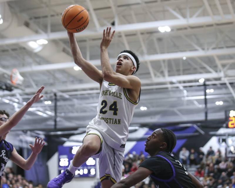 Yorkville Christian's Jayden Alford (24) puts up a shot during their Plano Christmas Classic semi-final basketball game between Yorkville Christian at Plano Monday, Dec 29, 2025 in Plano.