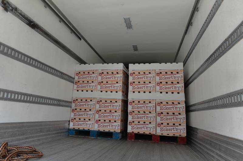 Boxes of peaches sit in a refrigerated truck waiting to be distributed by the Dixon Kiwanis Club on Thursday, Aug. 10, 2023.