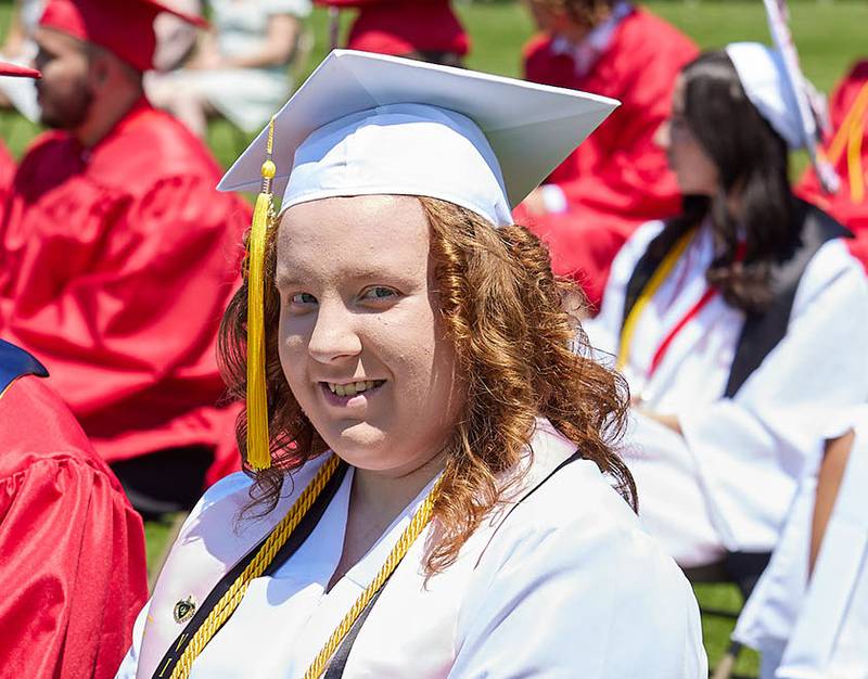 Hall senior Sara Beier smiles during the graduation ceremony on Sunday May 21, 2023 at Hall Township High School.