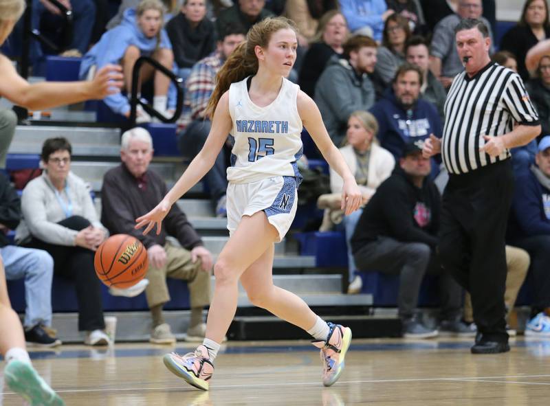 Nazareth's Mary Bridget Wilson (15) looks for an outlet during the girls varsity basketball game between Fremd and Nazareth on Monday, Jan. 9, 2023 in La Grange Park, IL.