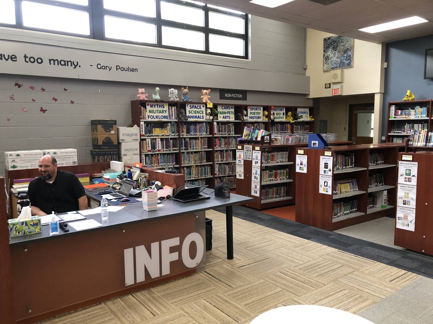 Harrison School's librarian Tim Yoder waits for families to stop in during the school's Meet Your Teacher event on Monday, Aug. 18, 2025. The tiny school district in Wonder Lake is expecting to triple in size as development comes to the village.