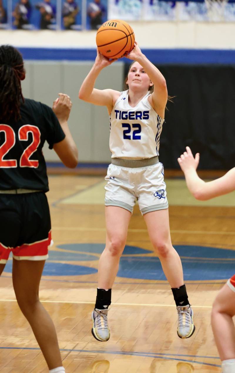 Princeton's Camryn Driscoll shoots from the top of the key against Sandwich in regional semifinal play Tuesday at Prouty Gym. The Tigresses won 50-35.