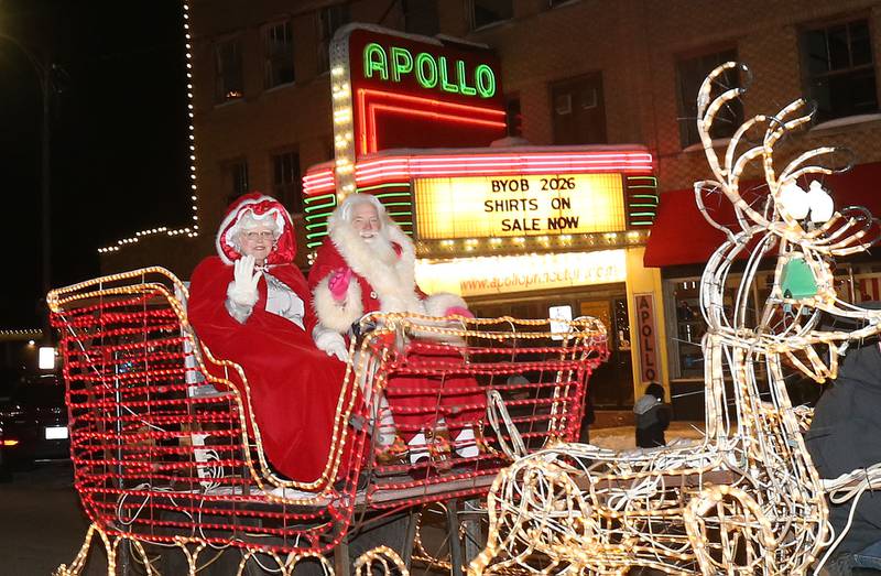 Santa and Mrs. Claus ride in a sleigh during the "Night of Lights" parade on Friday, Dec. 5, 2025 downtown Princeton. The event featured the Christmas tree lighting at Veterans Park a lighted Christmas parade down Main Street,  Living Windows, a Candy Cane Hunt, and visits with Santa.