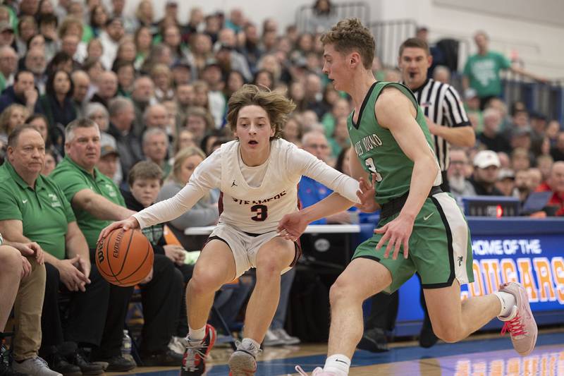 Fulton’s Payton Curley handles the ball while being guarded by Scales Mound’s Thomas Hereau Friday, March 3, 2023 in the 1A sectional final in Lanark.