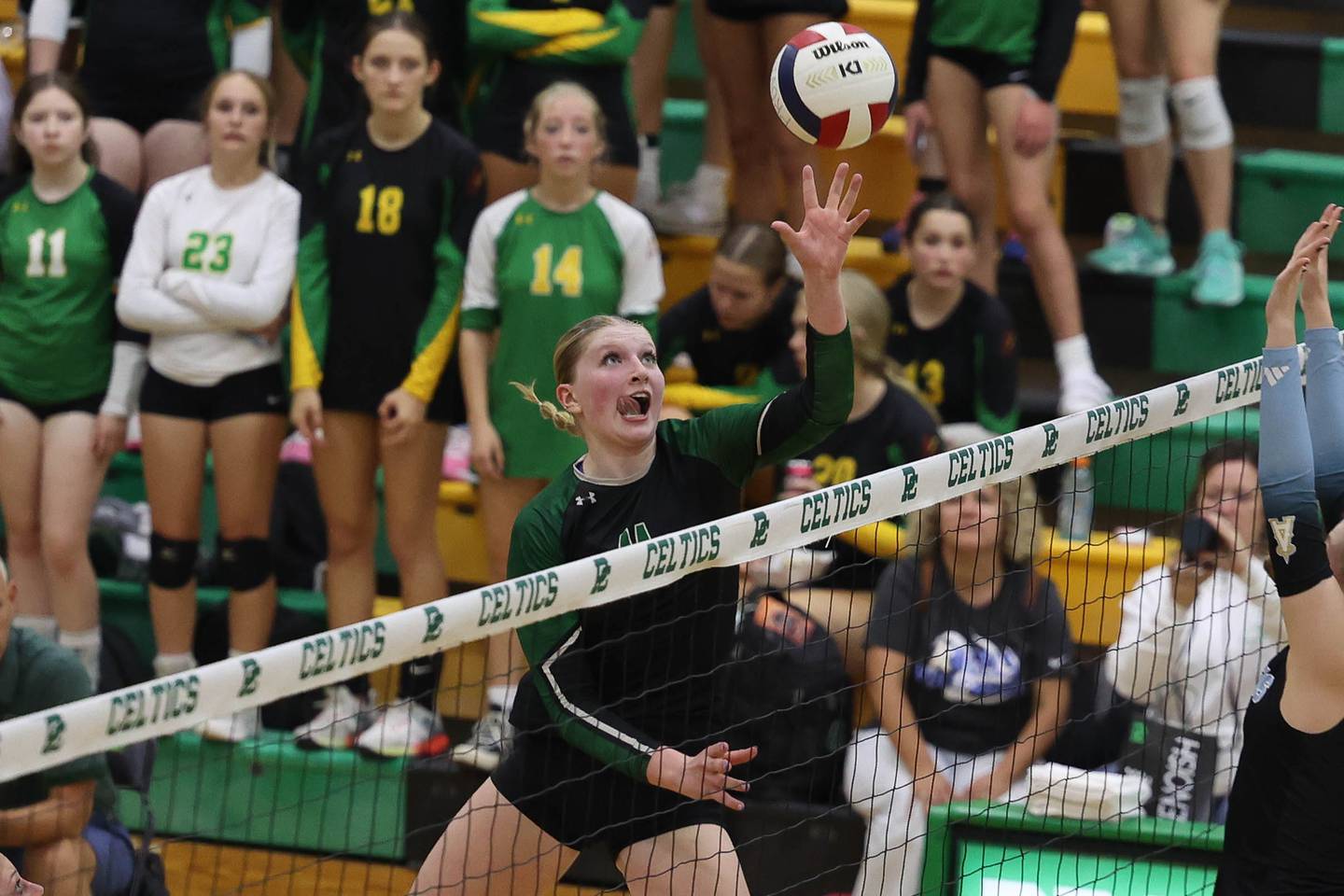 Providence's Abbey Knight pushes over a shot against Joliet Catholic on Thursday, Sept. 19, 2024 in New Lenox.