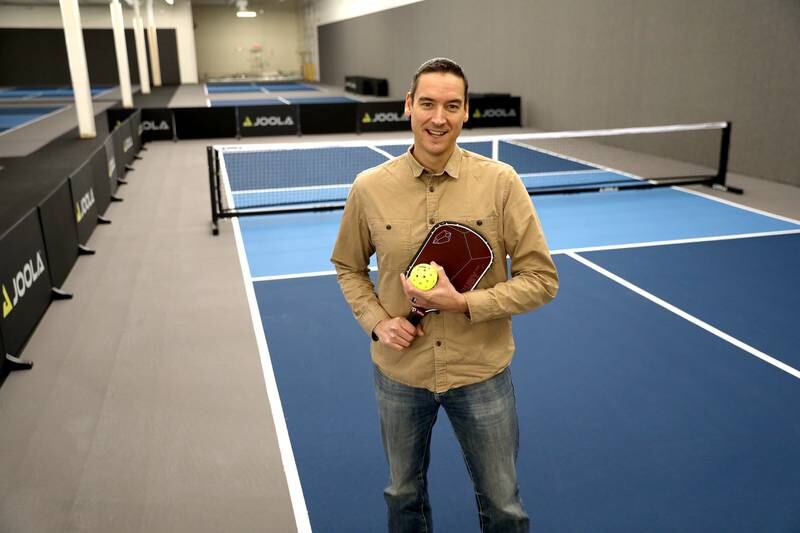 Owner Nathan Taylor stands inside Pickled, an indoor pickleball facility at 301 N. Randall Rd. in Batavia. Taylor hopes the facility opens in mid-December.
