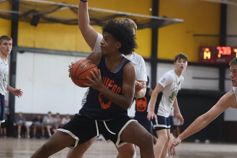 Oswego’s Dasean Patton battles under the basket against Central Catholic at the 37th Morris Boys Shootout on Tuesday, June 25, 2024.