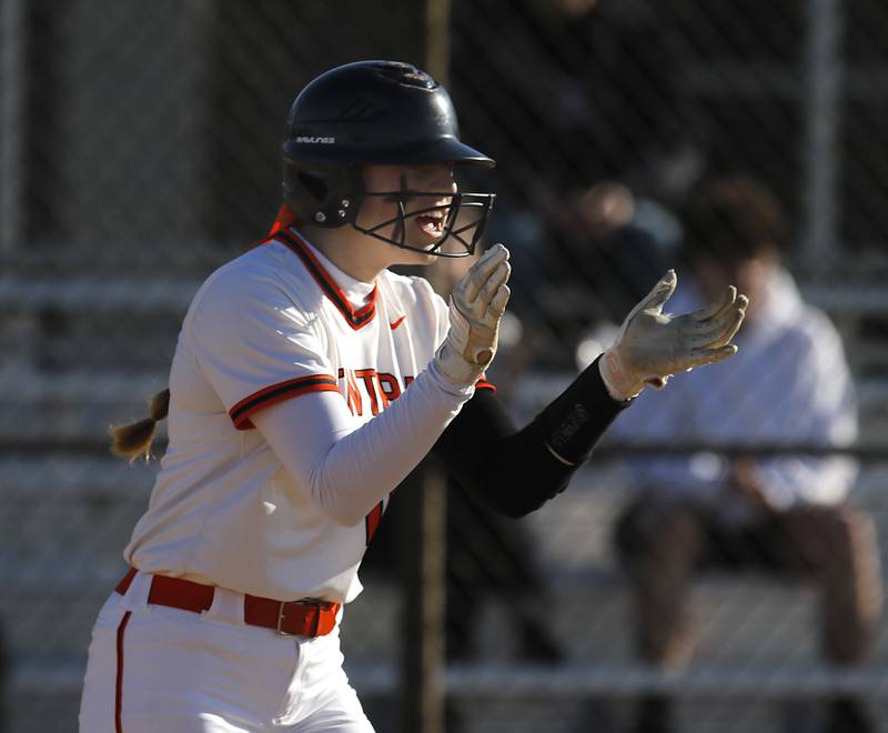 Crystal Lake Central’s Katie Svigelj celebrates scoring a run during a Fox Valley Conference softball game against Cary-Grove Thursday, April 6, 2023, at Crystal Lake Central High School.
