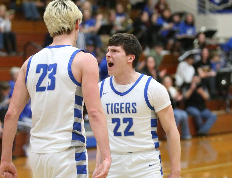 Princeton's Evan Driscoll reacts with teammate Noah LaPorte after scoring a basket against Ottawa on Monday, Feb. 5, 2024 at Prouty Gym.