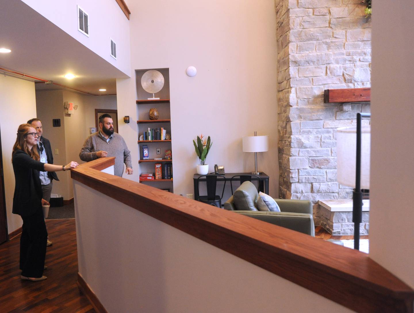 Staff members look at the atrium area as they prepare for the opening of the new Northern Illinois Recovery Center, 2602 Route 176, Prairie Grove, on Tuesday, March 22, 2022.