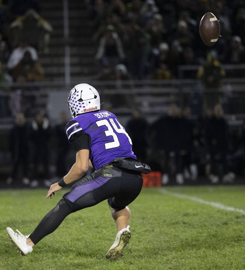 Dixon’s Owen Belzer loses control of a kick off against Coal City Friday, Nov. 7, 2025.