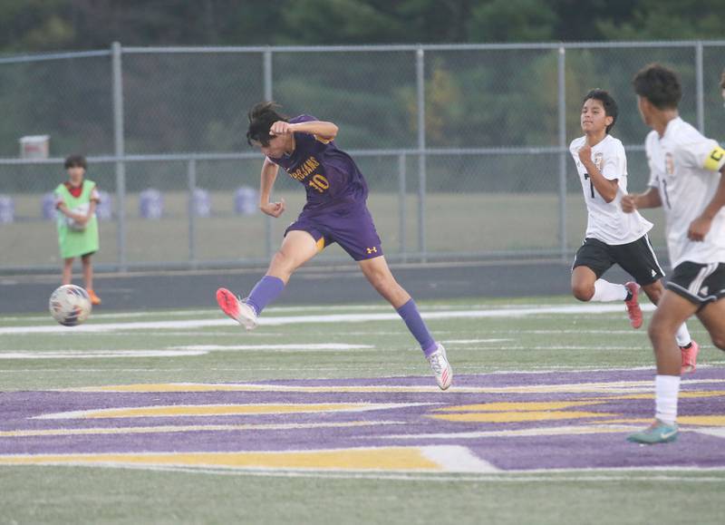 Mendota's Johan Cortez puches the ball in front of Kewanee defenders during the Three Rivers Tournament on Thursday, Oct. 2, 2025 at Mendota High School.
