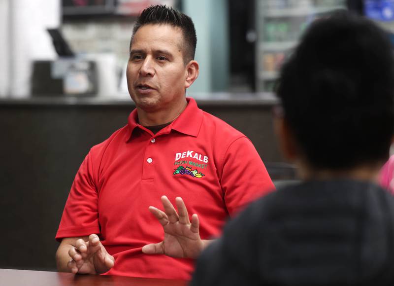 Martin Garcia, owner of DeKalb Fresh Market, talks about his reasons for participating in a Day Without Immigrants Monday, Feb. 3, 2025, during a meeting at Flamingo Restaurant & Ice Cream in DeKalb. More than 30 DeKalb County businesses closed on Monday to show solidarity in their stance against President Donald Trump’s anti-immigration policy.