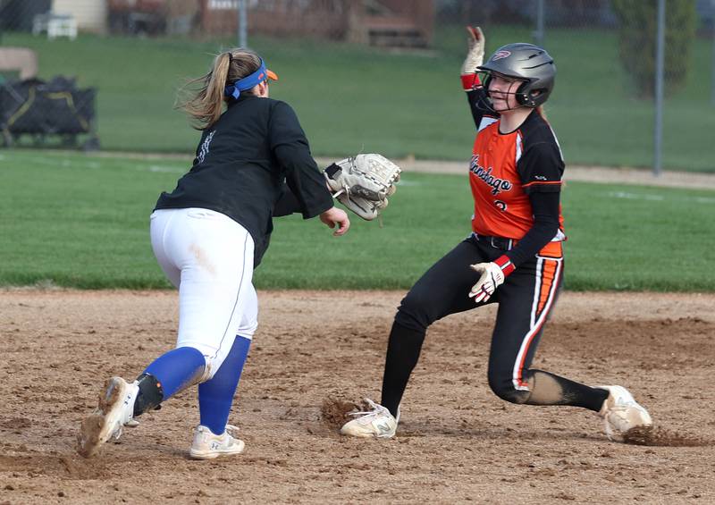Genoa-Kingston’s Elizabeth Davis tags out Winnebago’s Grace Corl during their game Monday, April 21, 2025, at Genoa-Kingston High School.