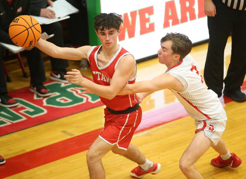Ottawa's Lucas Farabaugh looks to pass the ball off around Streator's Nolan Ketcham during the Class 3A Regional semifinal game on Wednesday, Feb. 26, 2025 in Sellett Gymnasium at L-P High School.