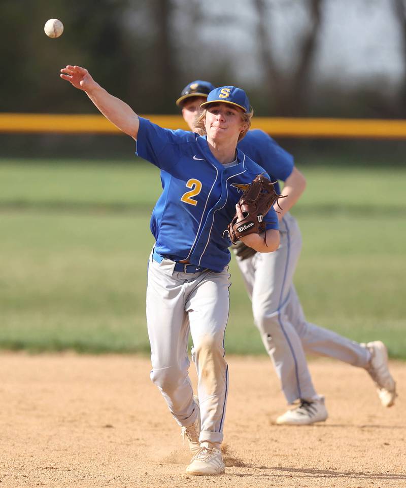 Somonauk's Parker Wasson throws the ball to first during their game against Hinckley-Big Rock Wednesday, May 4, 2022, at Hinckley-Big Rock High School.