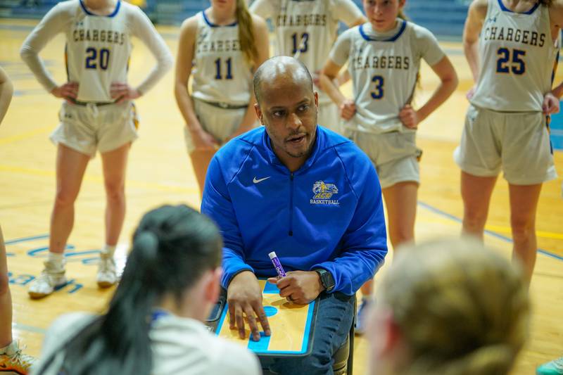 Aurora Central Catholic's head coach LeVada Smith talks to his players during a basketball game against Waubonsie Valley at Aurora Central Catholic High School on Thursday, January 30, 2025.