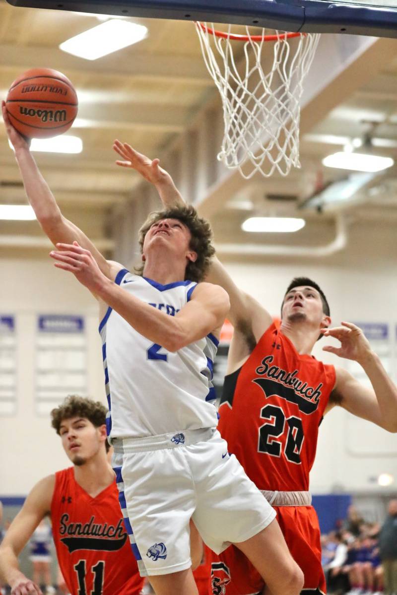 Princeton's Teegan Davis shoots away from Sandwich's Owen Sheley Tuesday at Prouty Gym. The Tigers won 60-43.