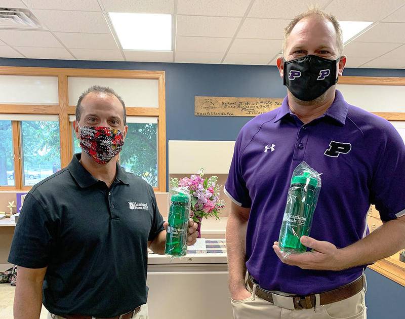 accepts donation of reusable water bottles for students Shaw Local