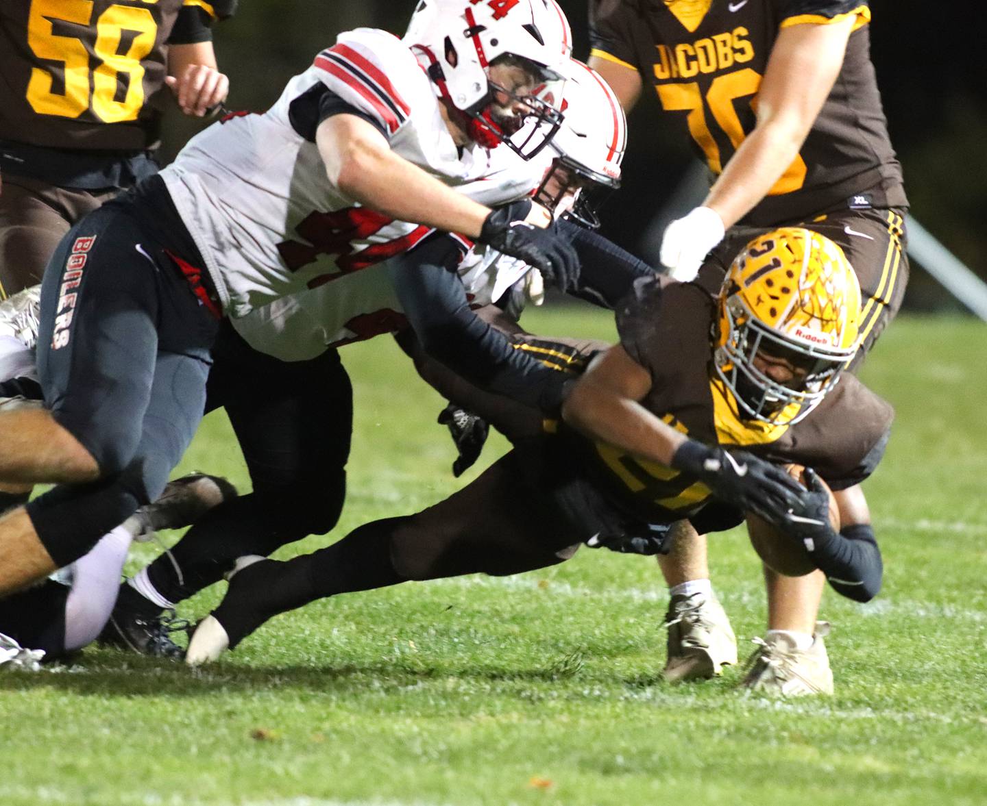 Jacobs’ Mike Cannady dives for extra yardage against Bradley-Bourbonnais  in first-round IHSA football playoff action on Friday, Nov. 1, 2024, at  Jacobs High School  in Algonquin.