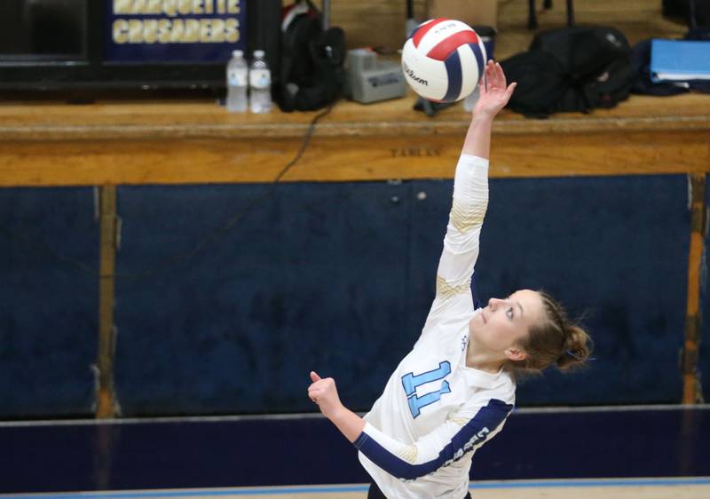 Marquette's Ava Offermann reaches up to send the ball to the Newark side of the net on Wednesday, Aug. 27, 2025 in Bader Gymnasium.