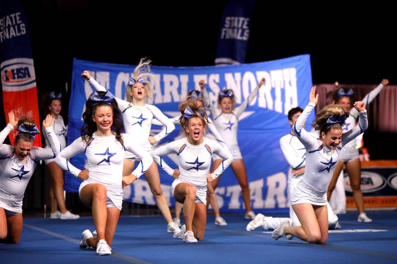 Members of the St. Charles North cheerleading team compete in the coed team division of the IHSA State Finals on Saturday, Feb. 8, 2025 at Grossinger Motors Arena in Bloomington.