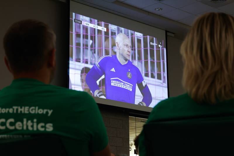 A couple watches the Atlanta and Miami soccer match at the Providence Catholic Brad Guzan watch party on Tuesday, July 25 in New Lenox. Guzan is a Providence Catholic alumnus who plays goalie for MLS’ Atlanta United FC.