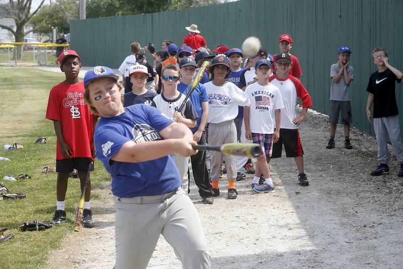 Alec Martinez, 8, Chicago, connects during a hitting drill last Saturday at Sycamore Park.