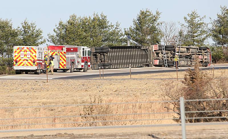 La Salle firefighters and EMS work the scene of a semi rollover on the west on ramp to Interstate 39 on Friday, Dec. 2, 2022 near La Salle. La Salle and Utica fire and EMS were dispatched to the scene. The incident happened shortly before 9:30a.m.