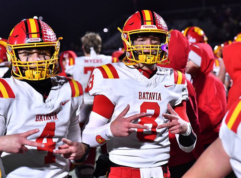 Batavia's Bodi Anderson (4) and Michael Vander Luitgaren celebrate after defeating Lincoln-Way Central during the Class 7A semifinal playoff game on Saturday, Nov 23, 2024 at New Lenox. (Dean Reid for Shaw Local News)