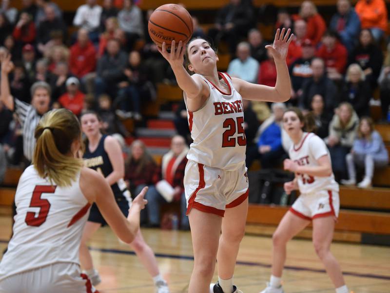 Benet's Samantha Trimberger (25) pulls down a rebound  during Tuesday’s IHSA Class 4A regional semifinal girls basketball game against Neuqua Valley in Aurora.