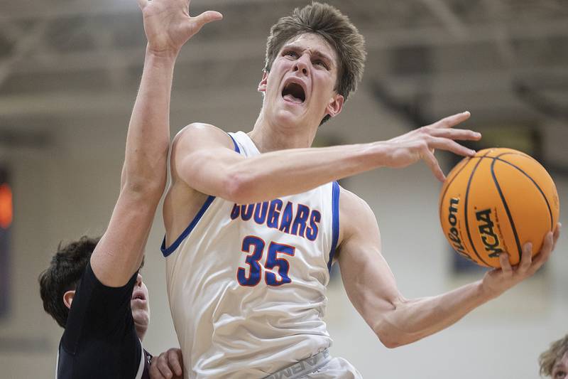Eastland’s Parker Krogman goes strong to the hoop against Dakota Wednesday, March 5, 2025, during the Class 1A boys basketball Sectional semifinal at Pecatonica High School.