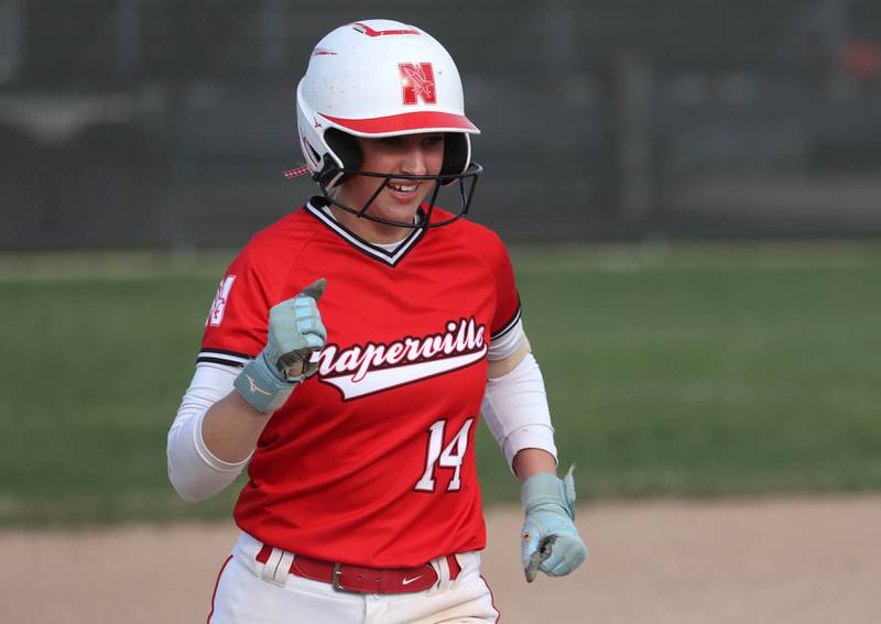Naperville Central's Riley Silvers rounds the bases after homering Wednesday, April 16, 2025, during their game against at DeKalb High School.