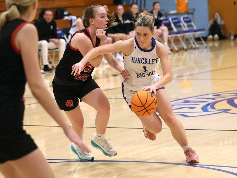 Hinckley-Big Rock's Payton Murphy drives the lane against Indian Creek's Bethany Odle during their game Thursday, Jan. 29, 2026, at Hinckley-Big Rock High School.