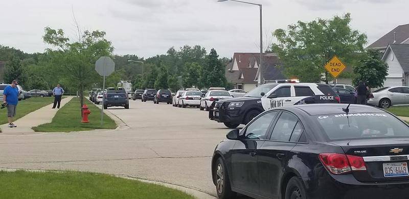 The aftermath of an early Monday morning what police said was a hostage situation on Justice Lake Drive in Joliet that left one man dead and three officers injured.