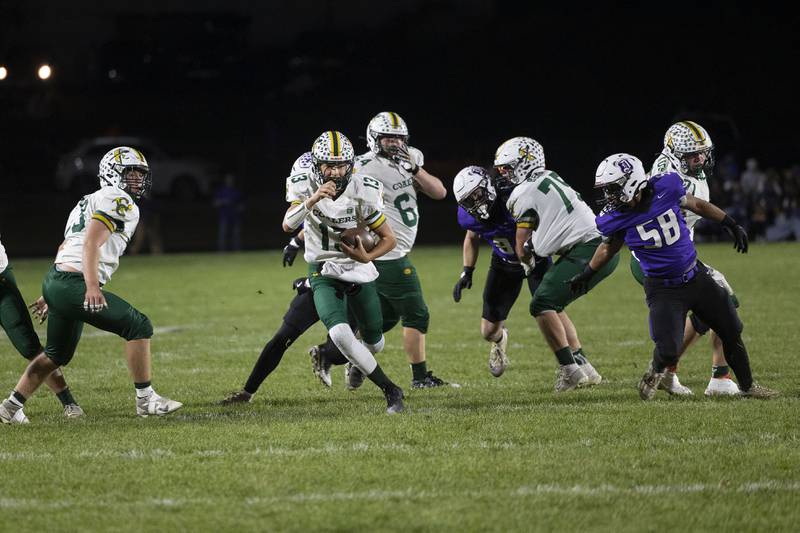 Coal City’s Connor Henline picks up yards against Dixon Friday, Nov. 7, 2025.