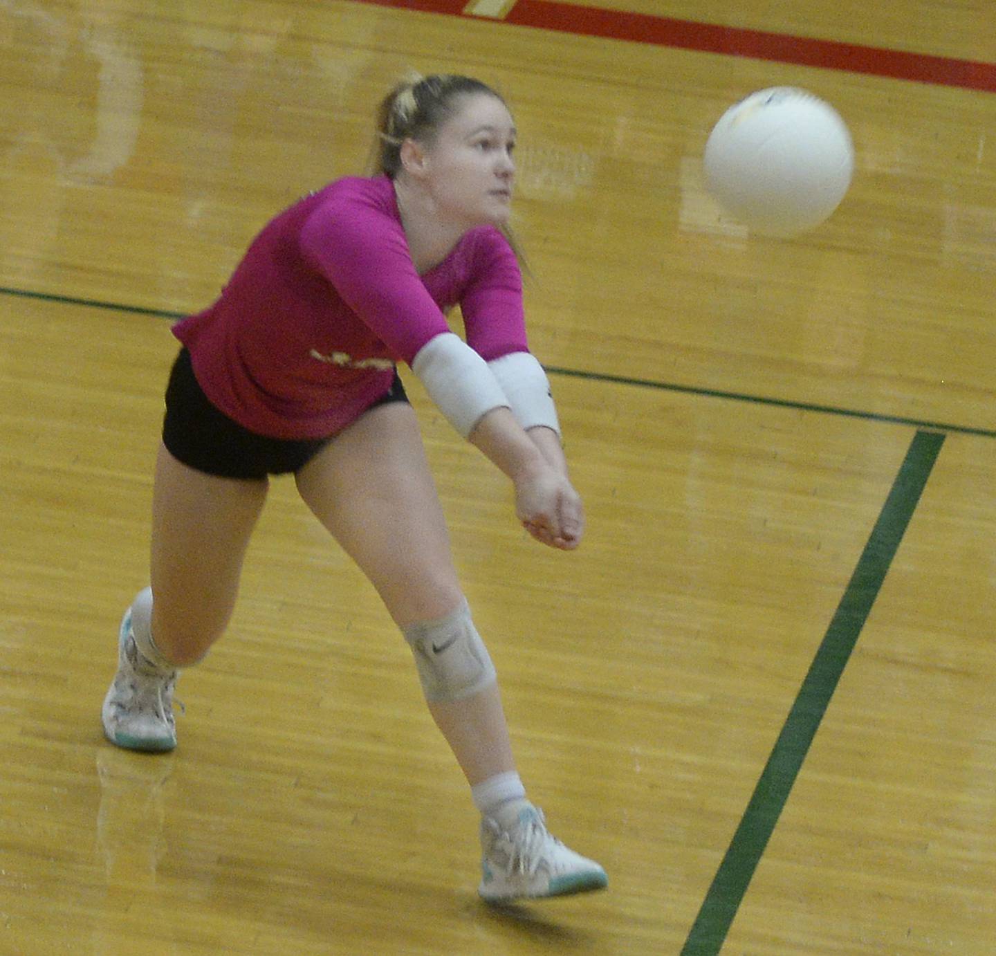 Dixon’s Natalie Davidson returns a volley in the second match during the Class 3A Sectional semifinal game on Monday, Oct. 31, 2022 at La Salle-Peru Township High School.