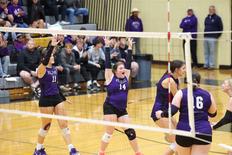 Wilmington's Addison Billingsley celebrates a team point during the Wildcats' loss in three sets, 25-16, 22-25, 17-25, to Pontiac in the IHSA Class 2A Herscher Regional championship on Thursday, Oct. 30, 2025.