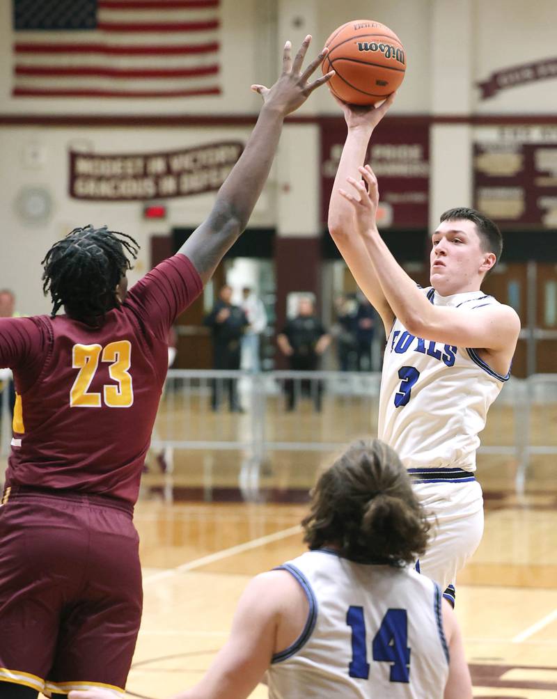Hinckley-Big Rock's Ben Hintzsche shoots over Chicago Marshall's Joel Brown Wednesday, March 1, 2023, during their Class 1A sectional semifinal matchup at Elgin High School.
