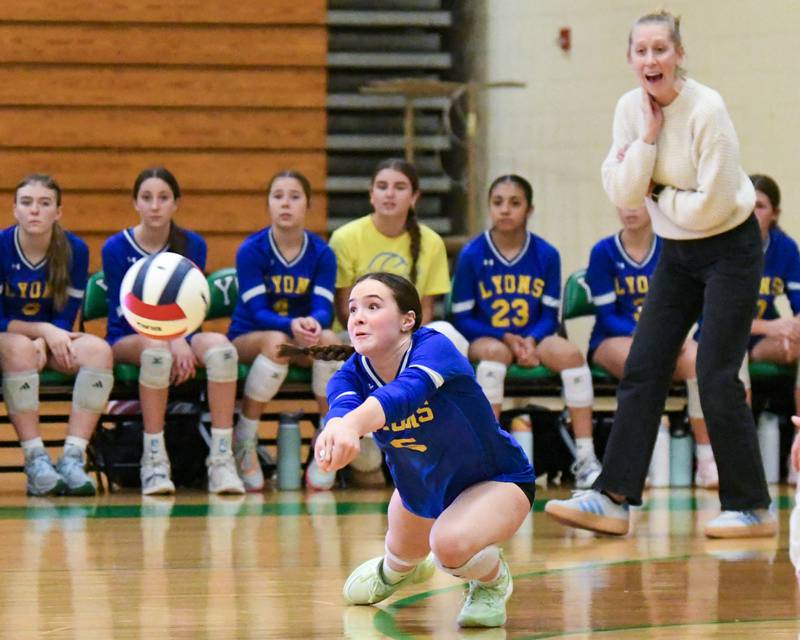 Lyons Township's Avery Lee (5) dives for the ball during the regional title game while taking on York on Thursday Oct. 30, 2025, held at York High School.